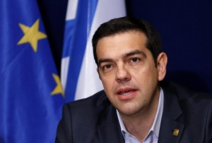 Greek PM Tsipras addresses a news conference after a EU leaders summit in Brussels